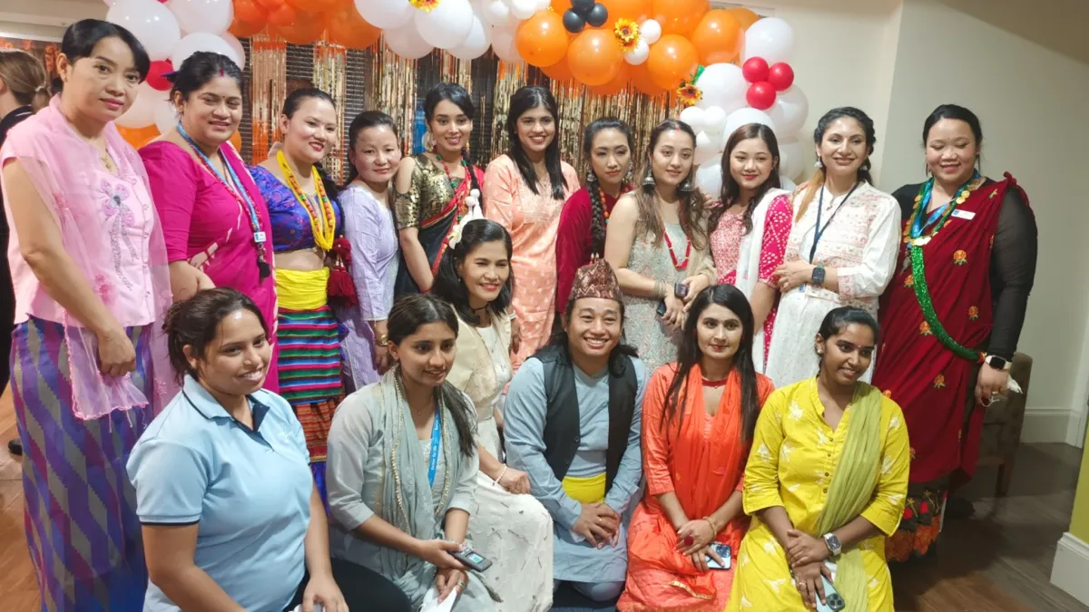 Aged care staff in cultural dress