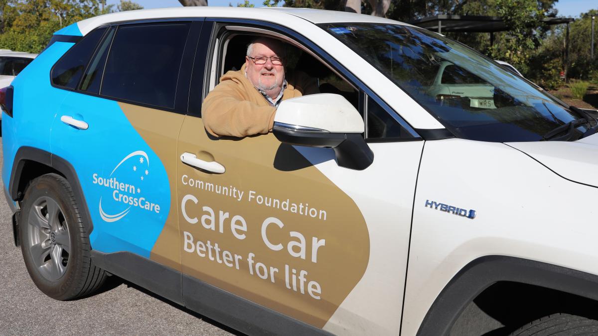 John Nairn driving the Care Car