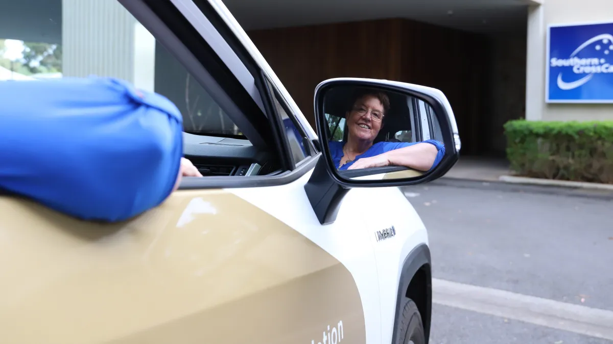 Dianne driving the Care Car