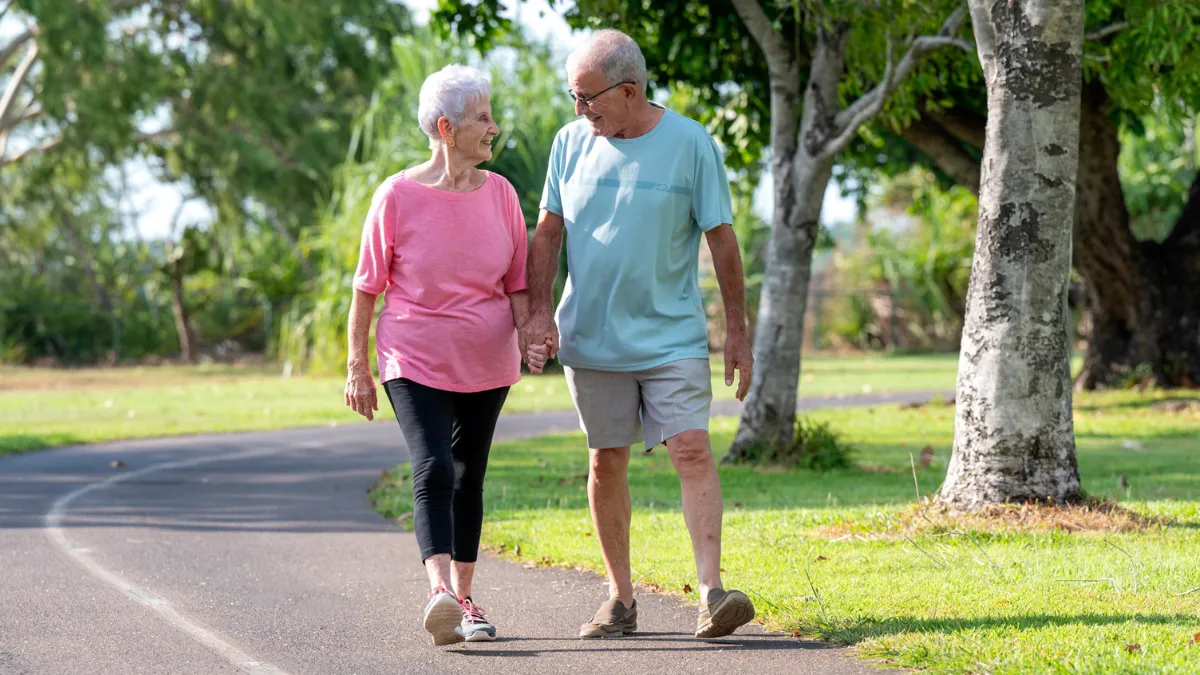Couple Walking Together Outside