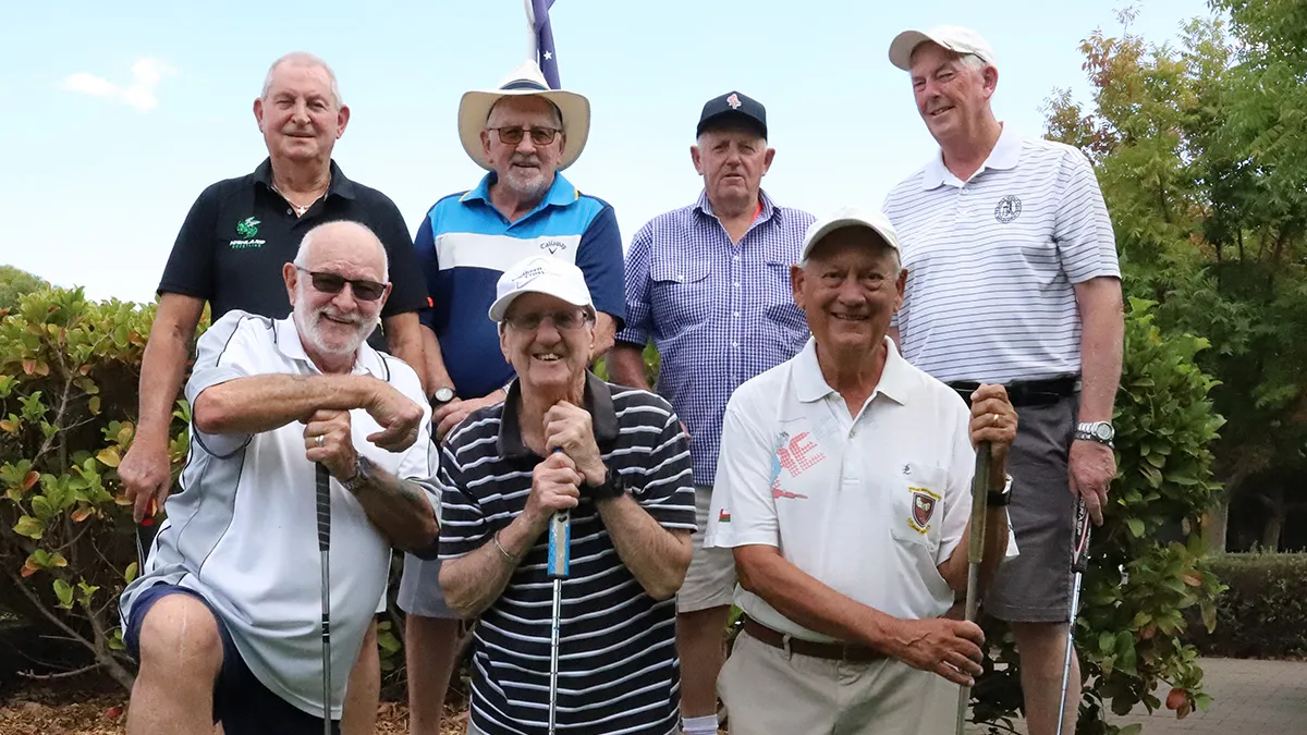 Group of Riverpoint Retirement Village male residents holding golf clubs
