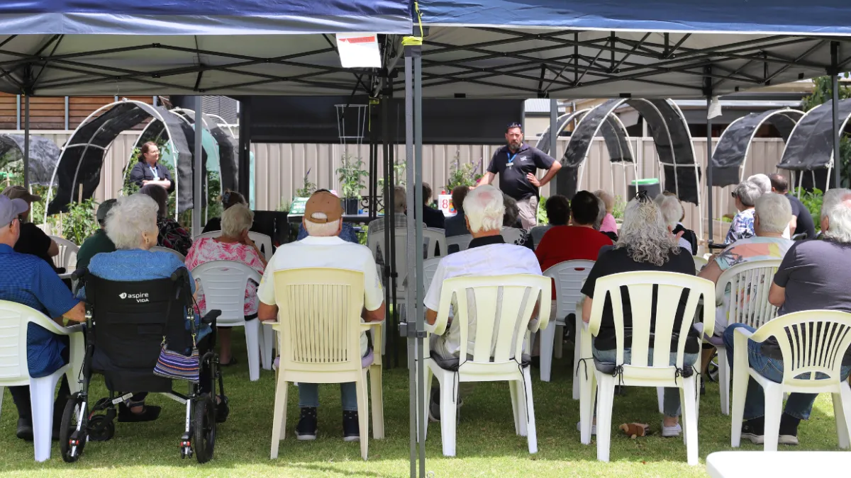 Residents listening to a talk