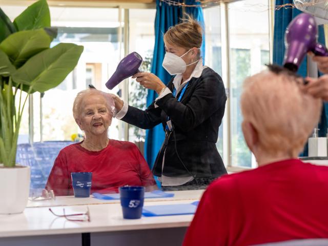 John Paul II Residential Care lady in hairdressers
