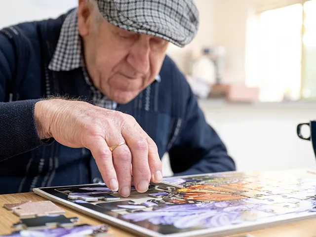 Client focusing on finishing the puzzle