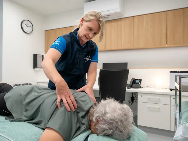 Lady Getting Massage From Physio