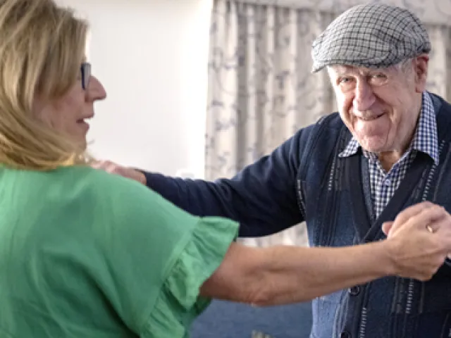 Client dancing with the Respite Assistant