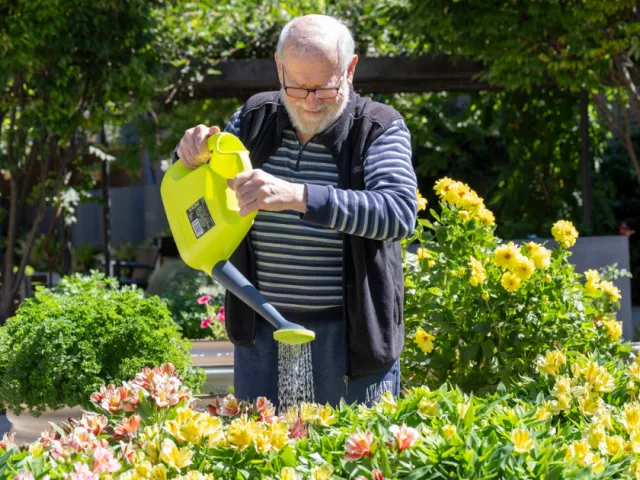 Residents In Garden At Oakfield Lodge Residential Care