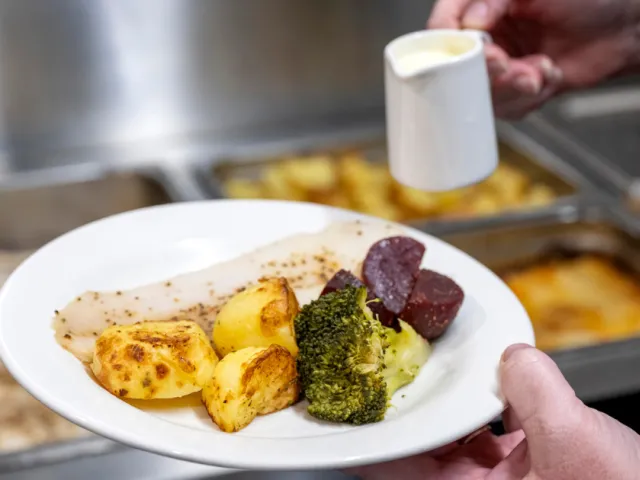 Hot Meal Being Served At Fullarton Residential Care 