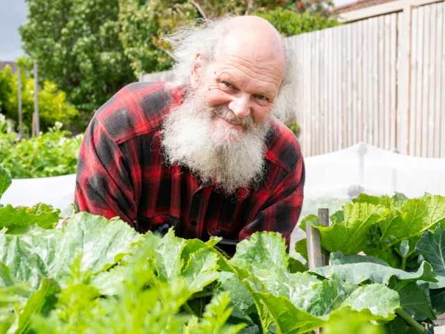 Male Resident In Community Garden At The Mornington Retirement Village