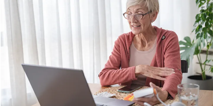 Lady On Laptop Using Health & Fitness Online Services