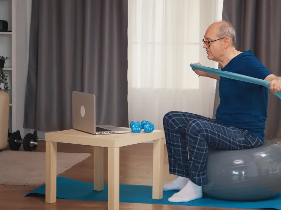 ManWithComputerExercising1920x1080