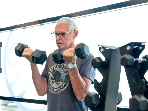Health Fitness Oakfield Rise Client Lifting Dumbbells 