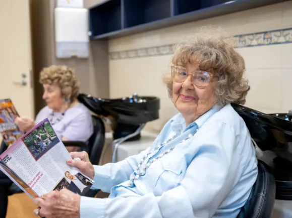 Resident At Hairdresser At Bucklands Residential Care