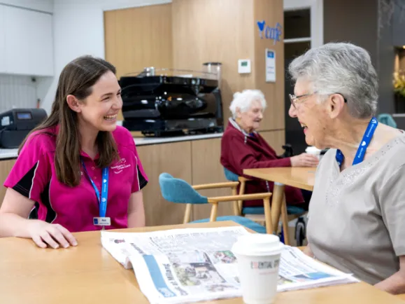 Lifestyle assistant with female client in cafe 