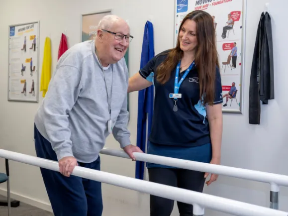 Labrina Allied Health staff member with Male resident 