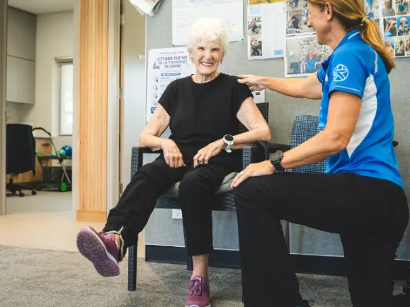 trainer and female client at Pearl Health & Fitness